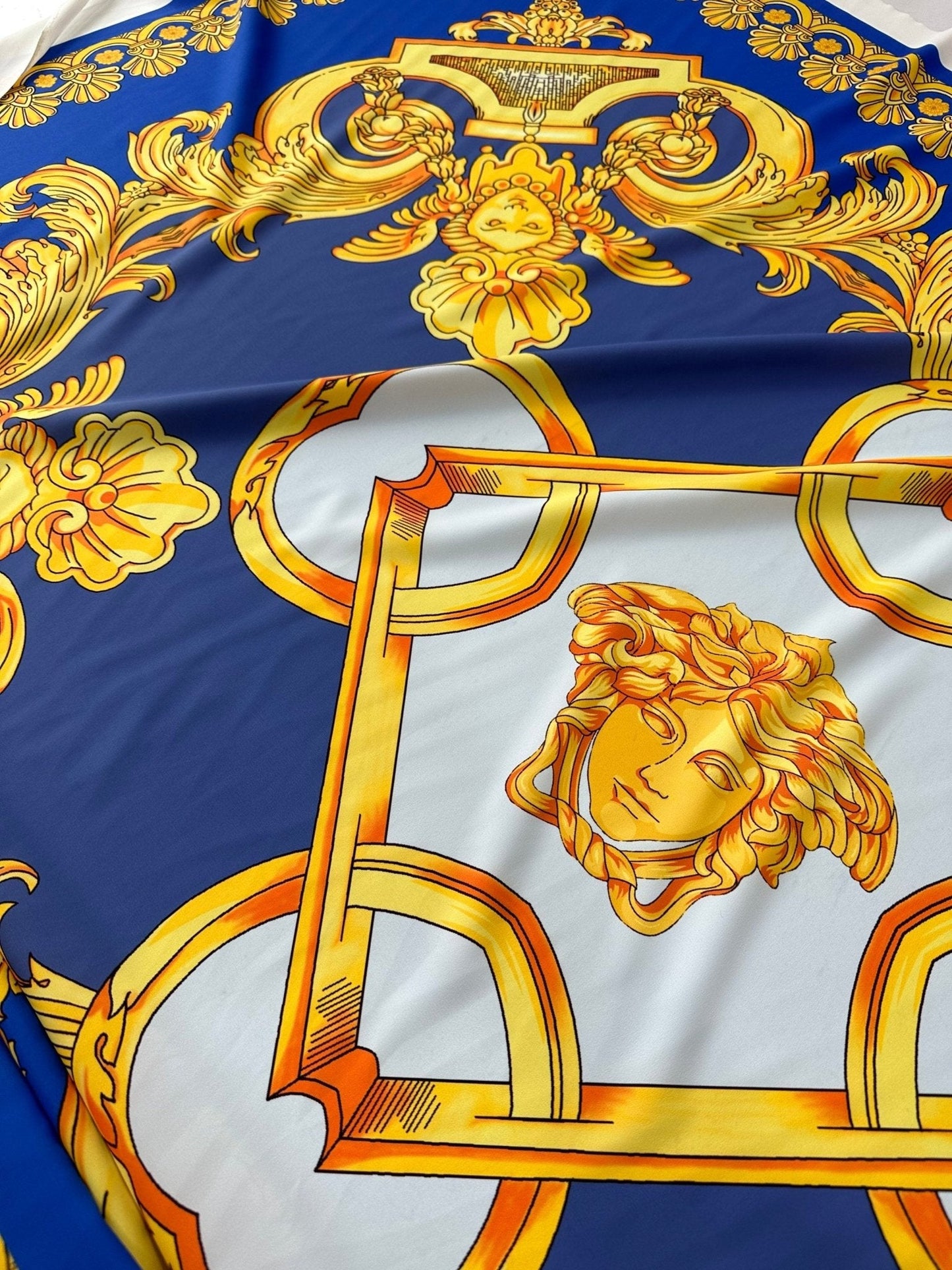 Baroque Gold Pattern Fabric on Royal Blue Background