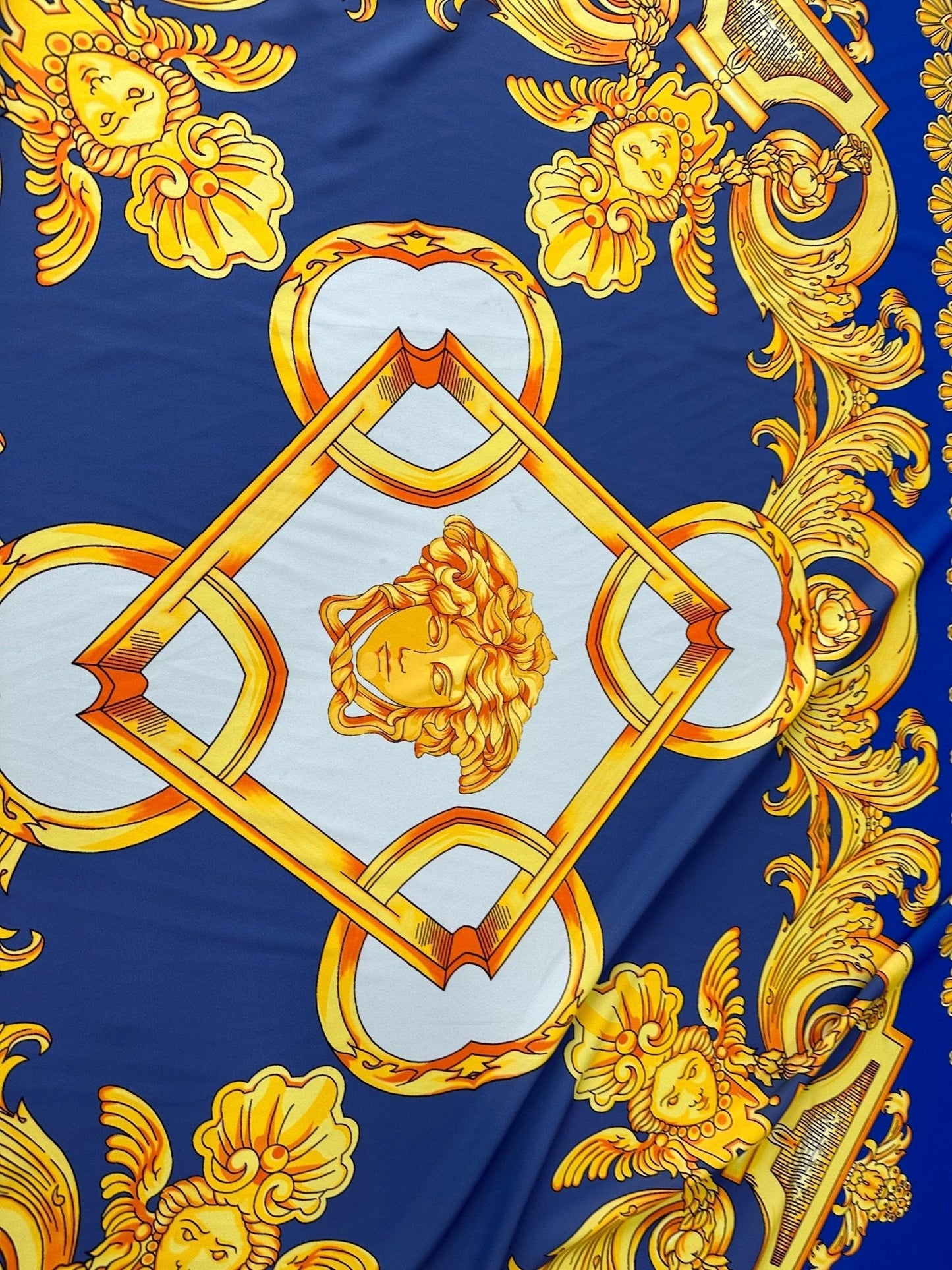 Baroque Gold Pattern Fabric on Royal Blue Background