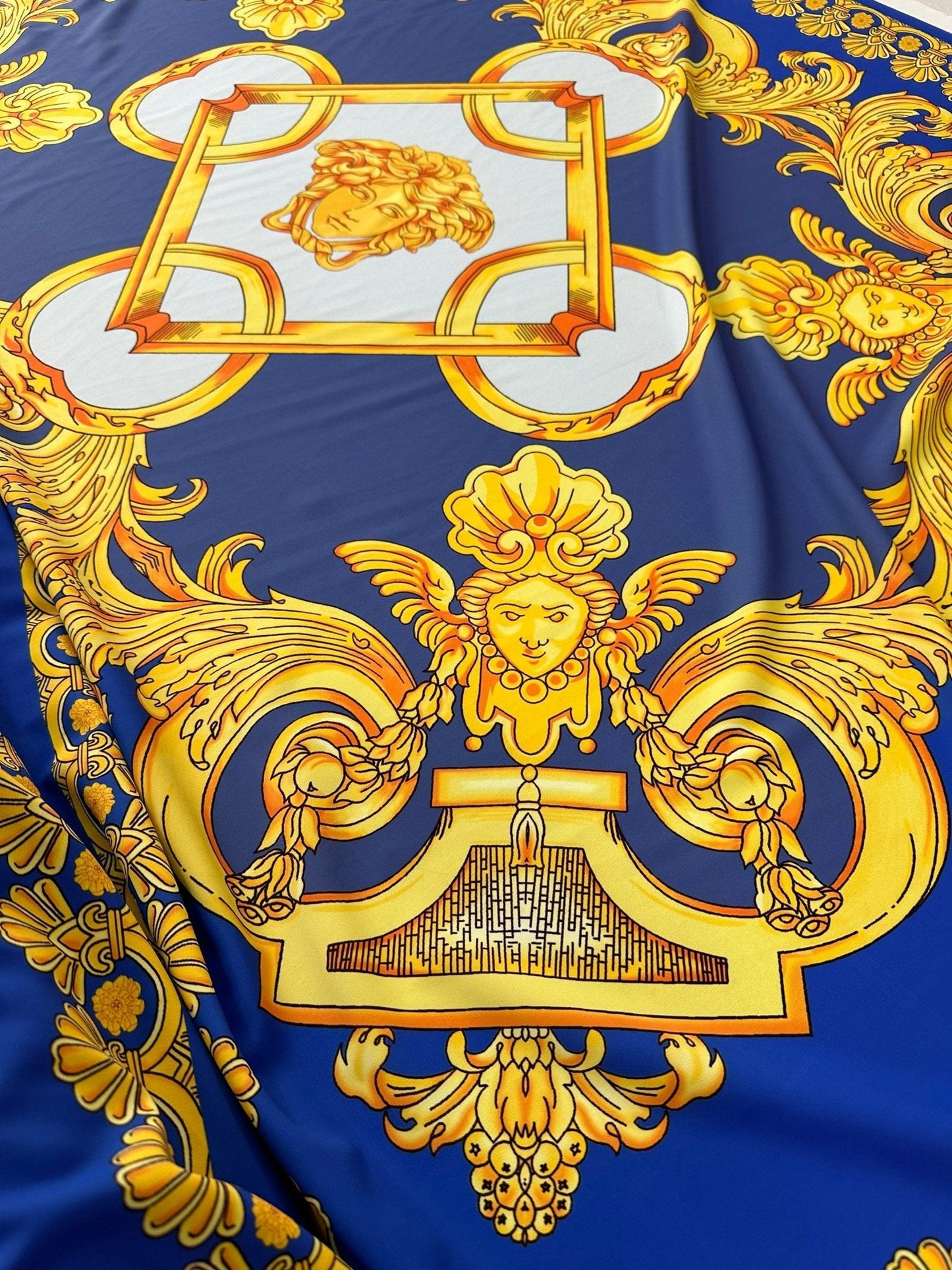 Baroque Gold Pattern Fabric on Royal Blue Background