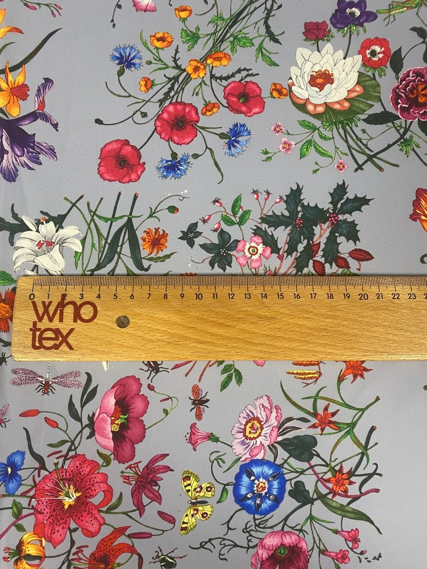 Colorful Floral Pattern on Light Grey Fabric