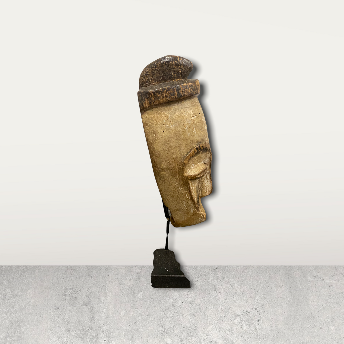 Small African mask on stand