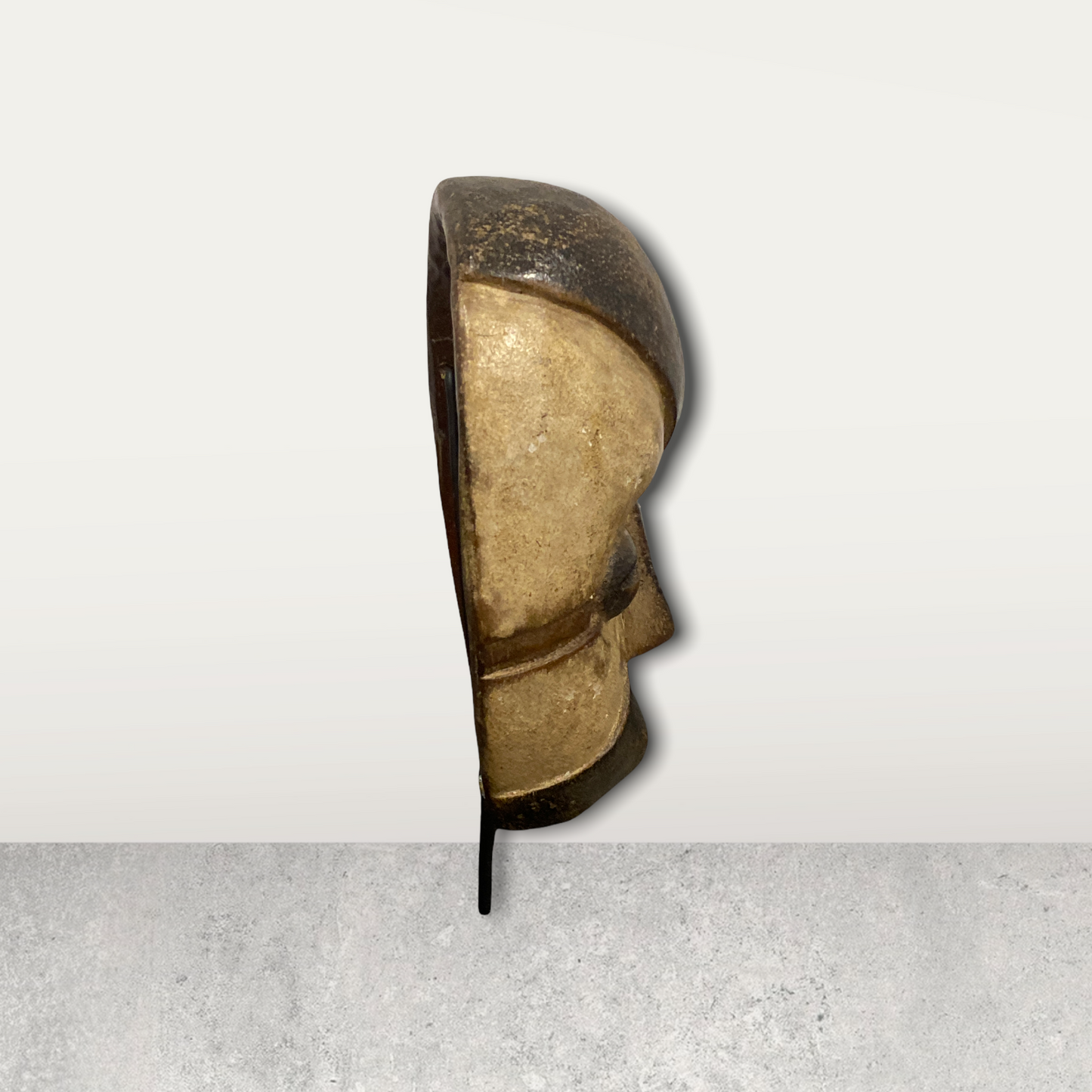 Small African mask on stand
