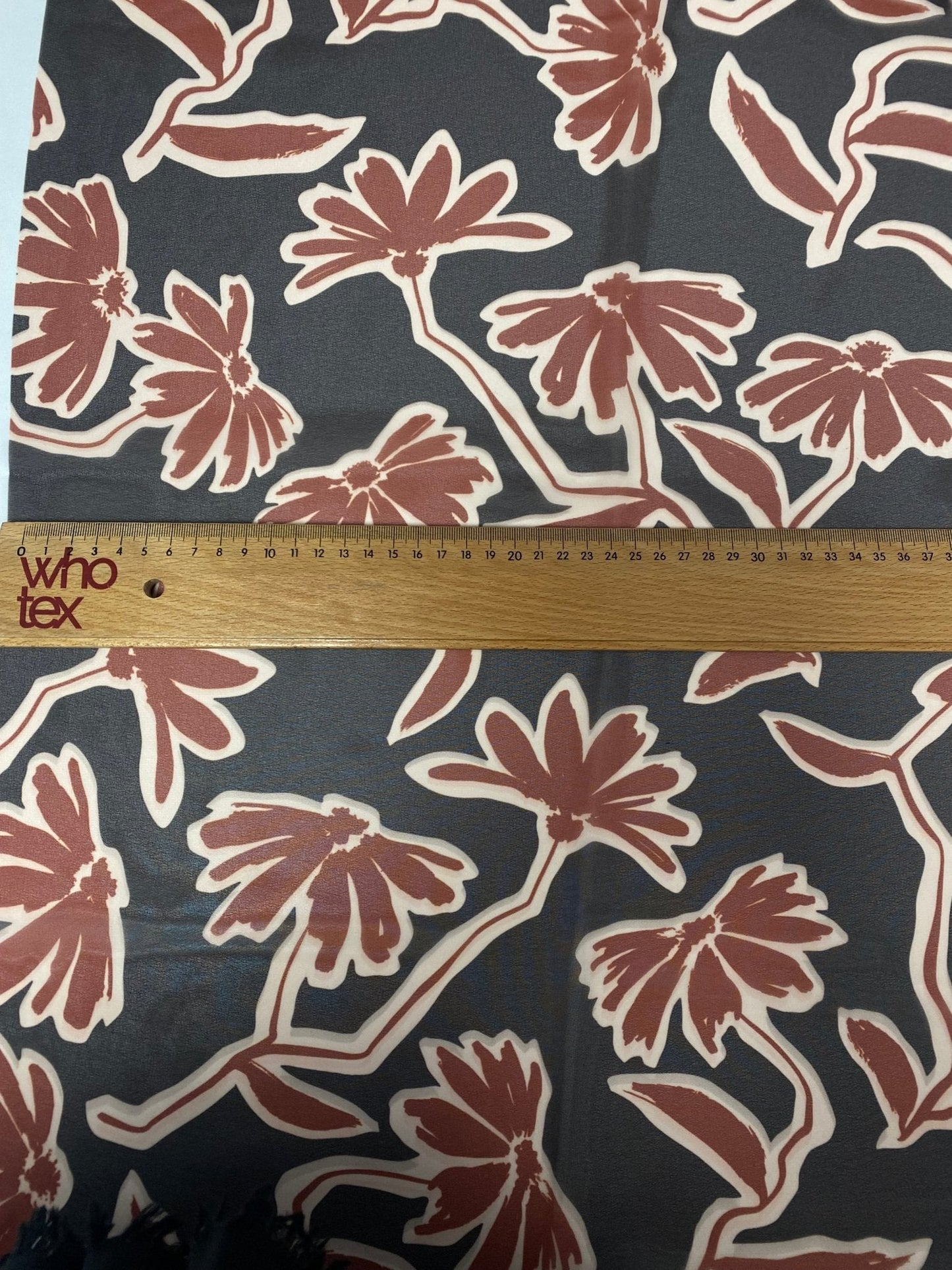 Rust Red Floral Print Fabric on Black Background
