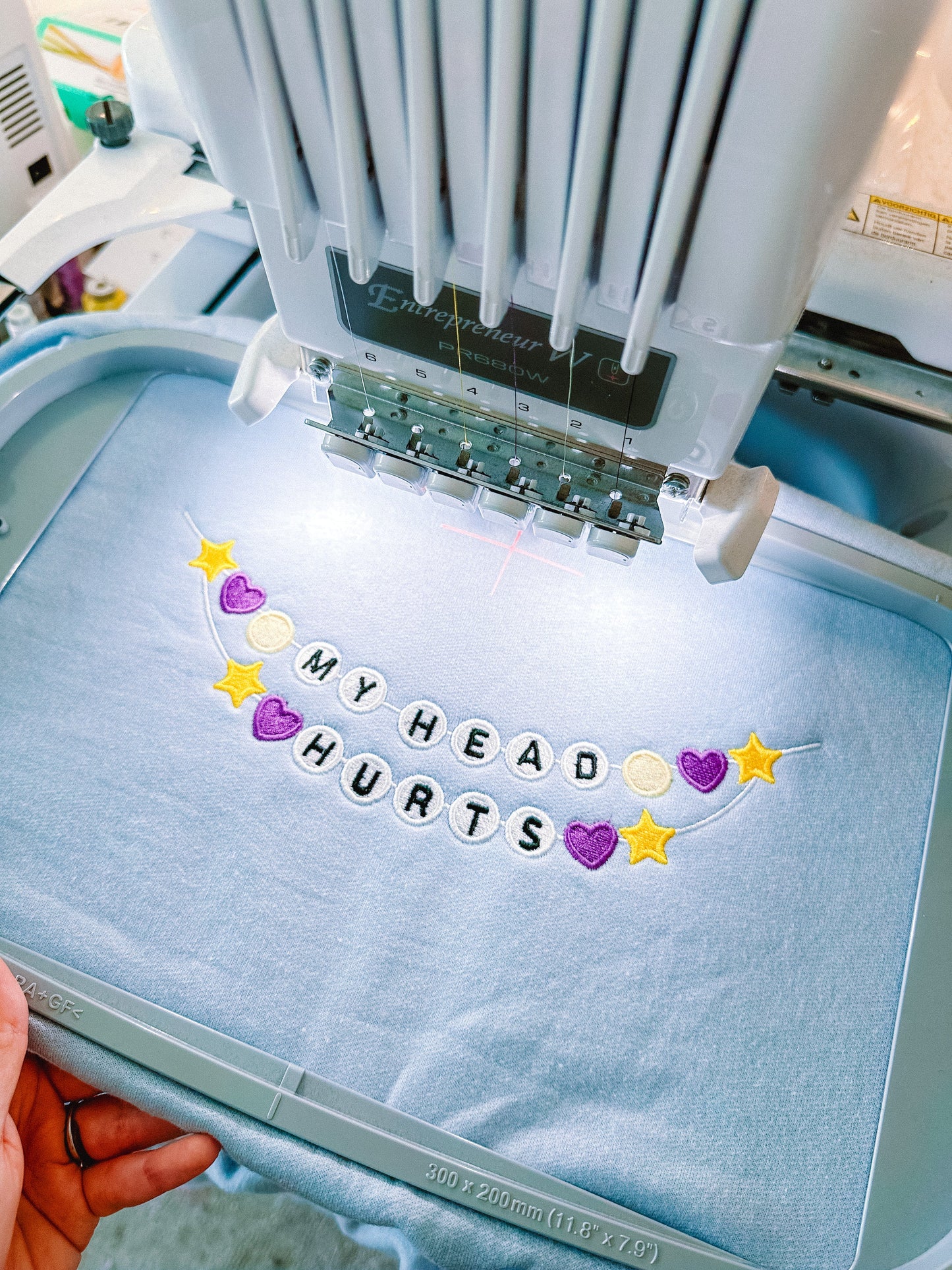 My Head Hurts Friendship Bracelet embroidered sweatshirt