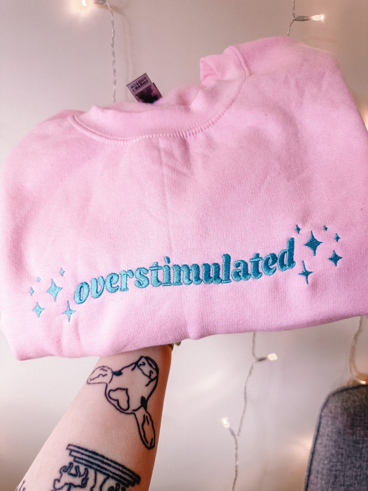 Overstimulated embroidered crewneck sweatshirt