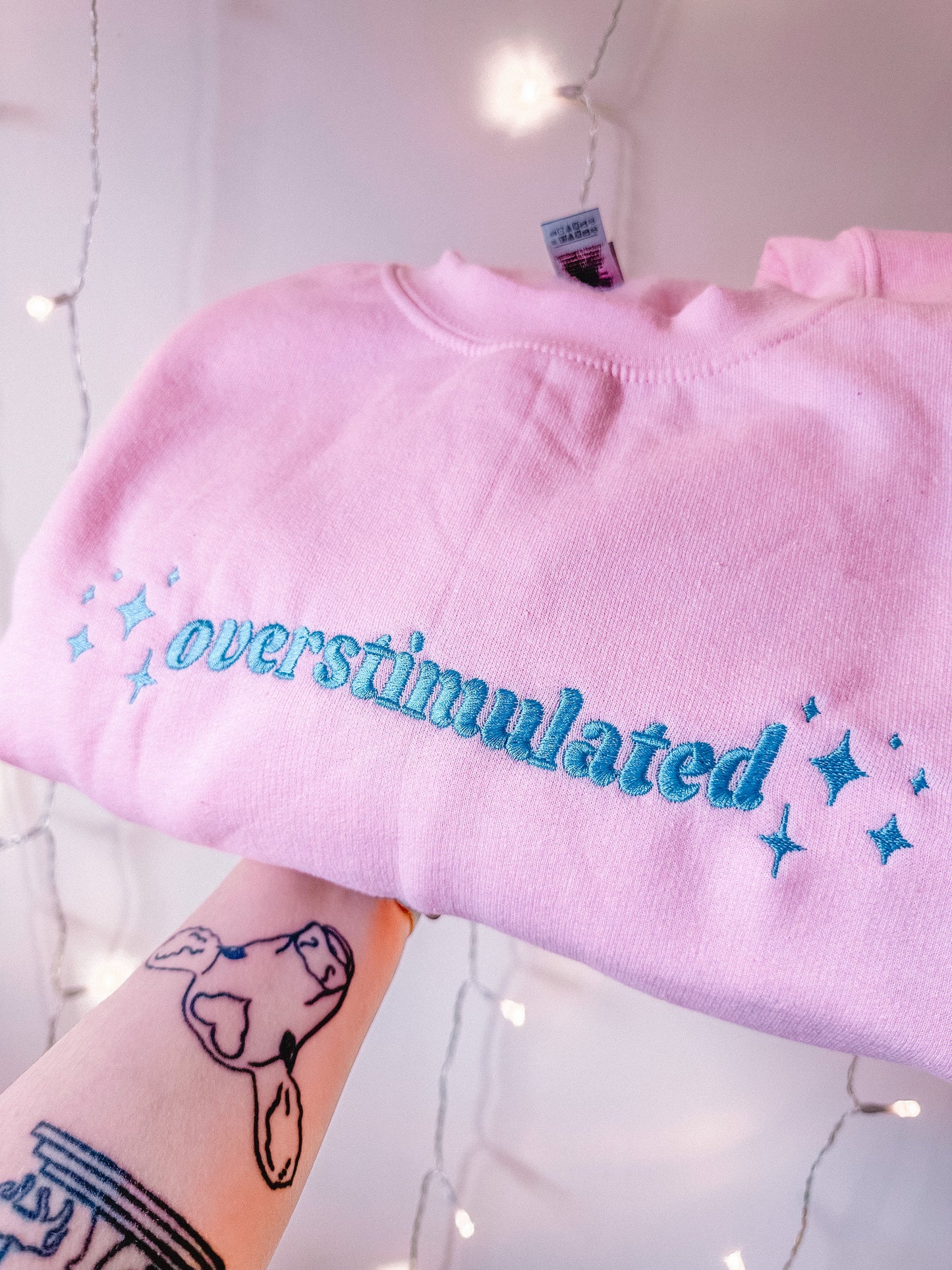 Overstimulated embroidered crewneck sweatshirt