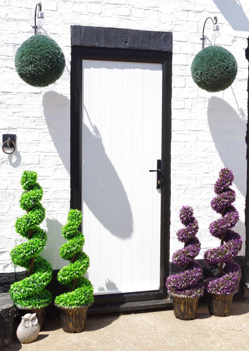 90cm Pair of Green Large Leaf Spiral Topiary Trees with Decorative Planters