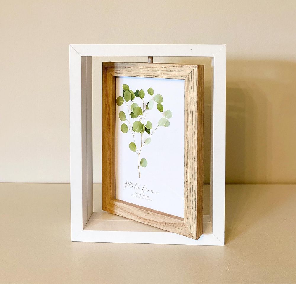 Exquisite Swivel Photo Frame. Dual-Sided Display for 4x6 Photos. Elegant Design. Perfect Home Decor.