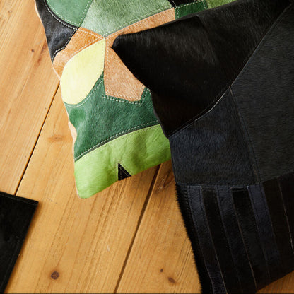 Bosie Safira Black And Grey Hair on Leather Cushion