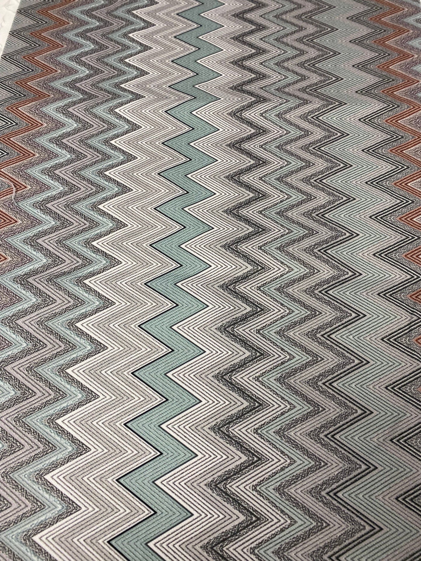 Geometric Chevron Pattern Fabric – Soft Textured Knit in Mint, Black & Rust Tones for Apparel and Home Decor