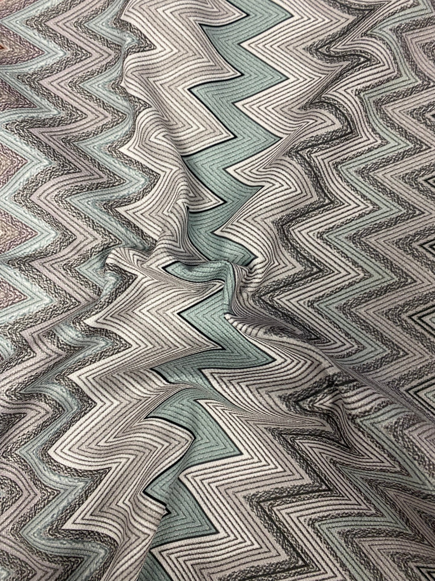 Geometric Chevron Pattern Fabric – Soft Textured Knit in Mint, Black & Rust Tones for Apparel and Home Decor