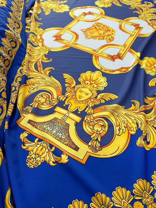Baroque Gold Pattern Fabric on Royal Blue Background