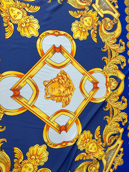 Baroque Gold Pattern Fabric on Royal Blue Background