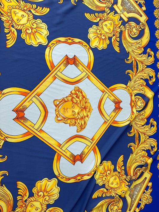 Baroque Gold Pattern Fabric on Royal Blue Background