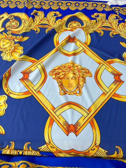 Baroque Gold Pattern Fabric on Royal Blue Background