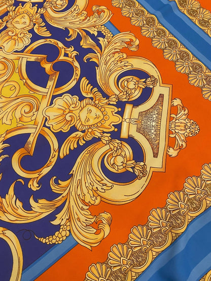 Baroque Pattern Fabric with Orange Border and Gold Accents