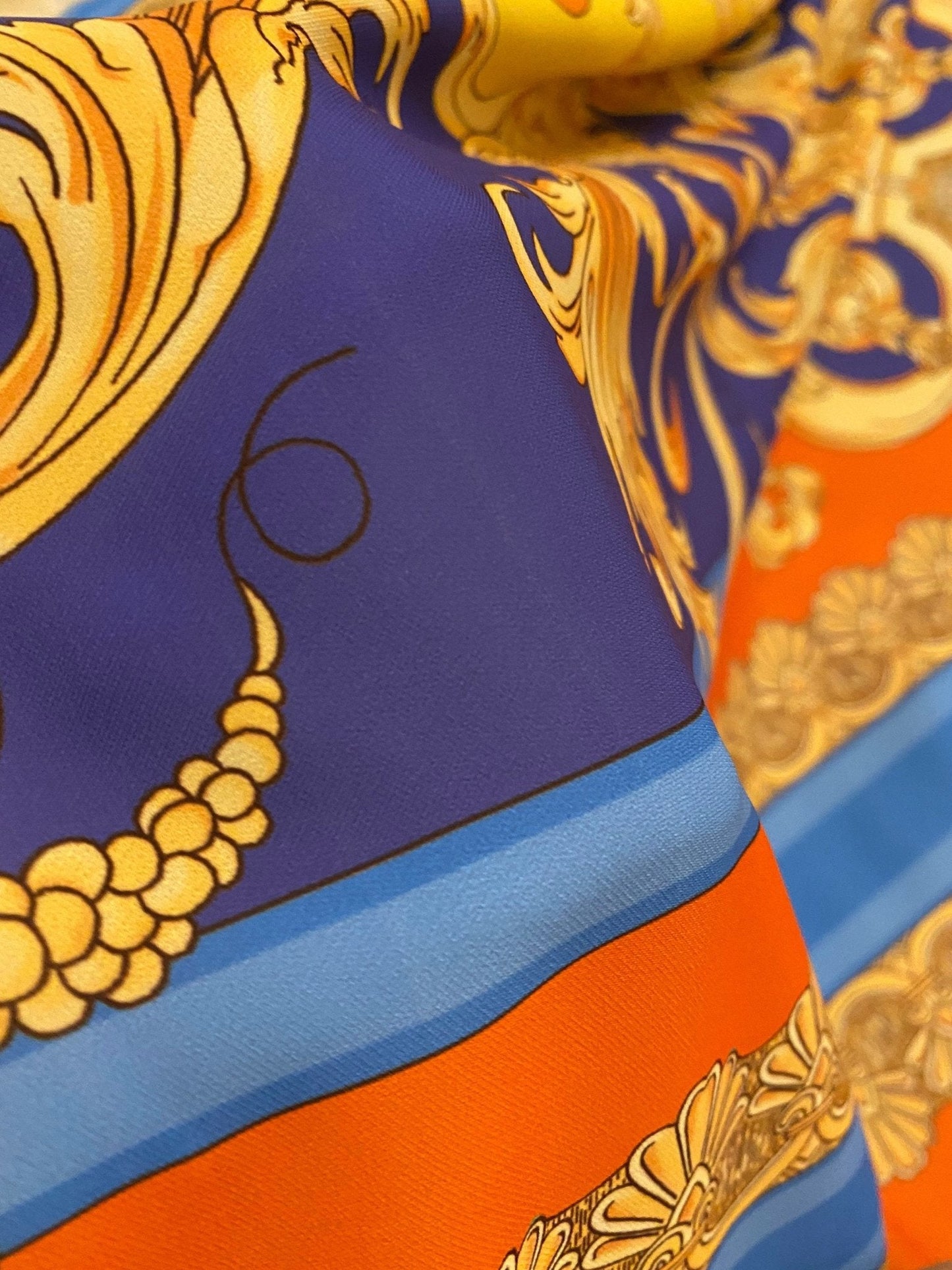 Baroque Pattern Fabric with Orange Border and Gold Accents