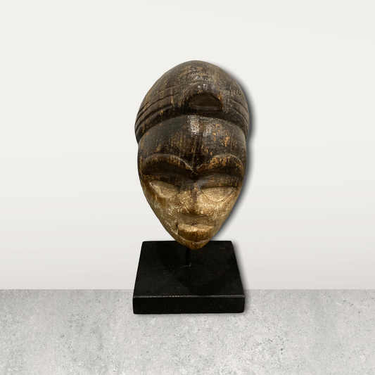 Small African mask on stand