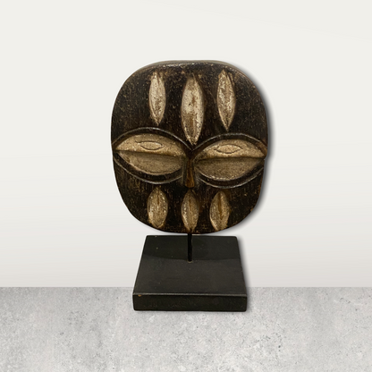 Small African mask on stand