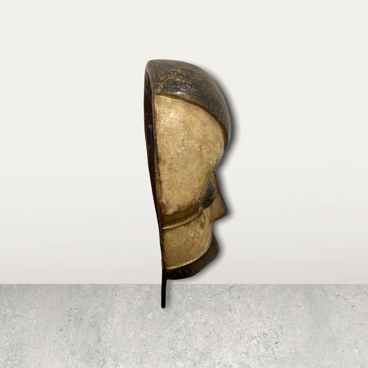 Small African mask on stand