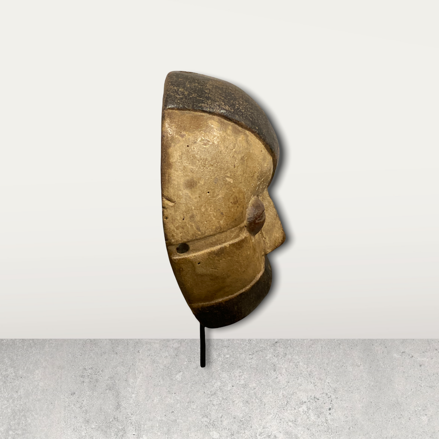 Small African mask on stand