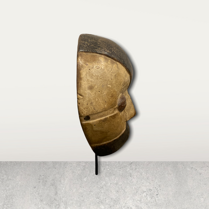 Small African mask on stand
