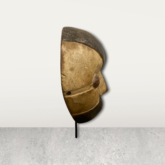 Small African mask on stand
