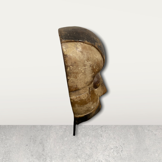 Small African masks on stands