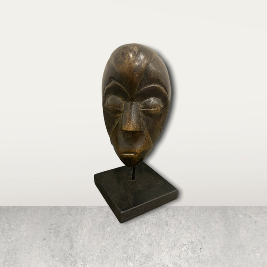 Small African mask on stand