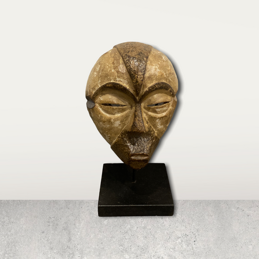 Small African mask on stand