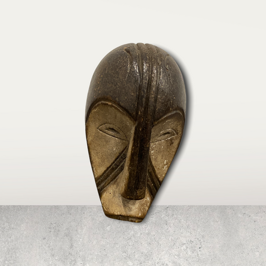 Small African mask on stand