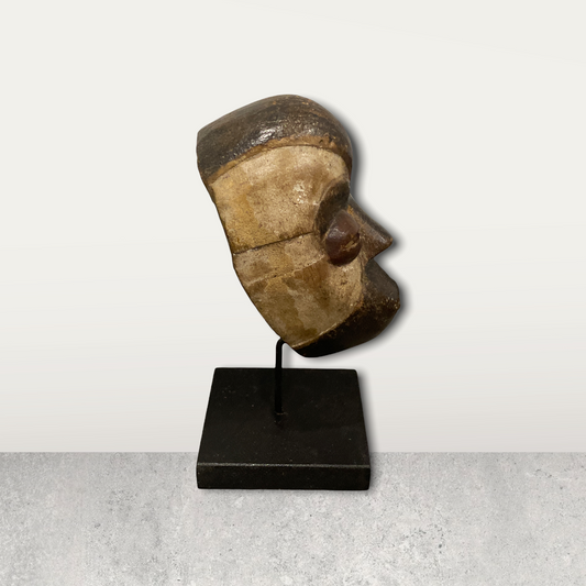 Small African mask on stand