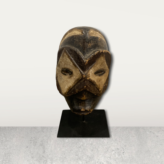 Small African mask on stand