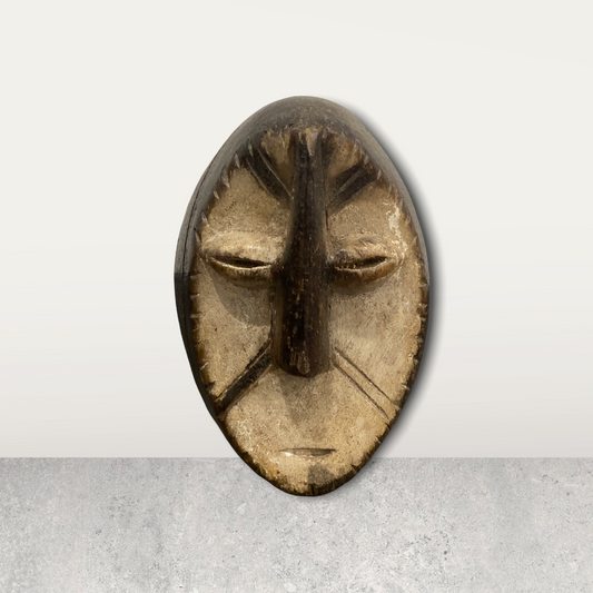 Small African mask on stand