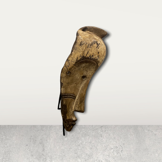 Small African mask on stand