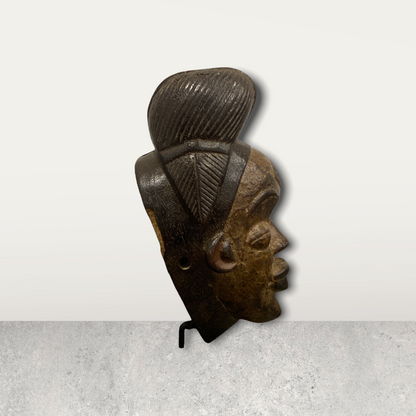 Small African mask on stands