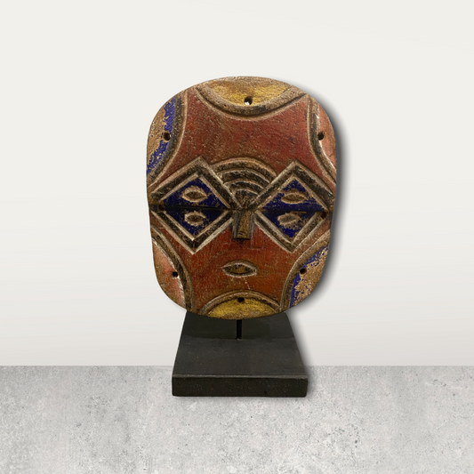 Small African mask on stand