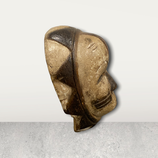 Small African mask on stand