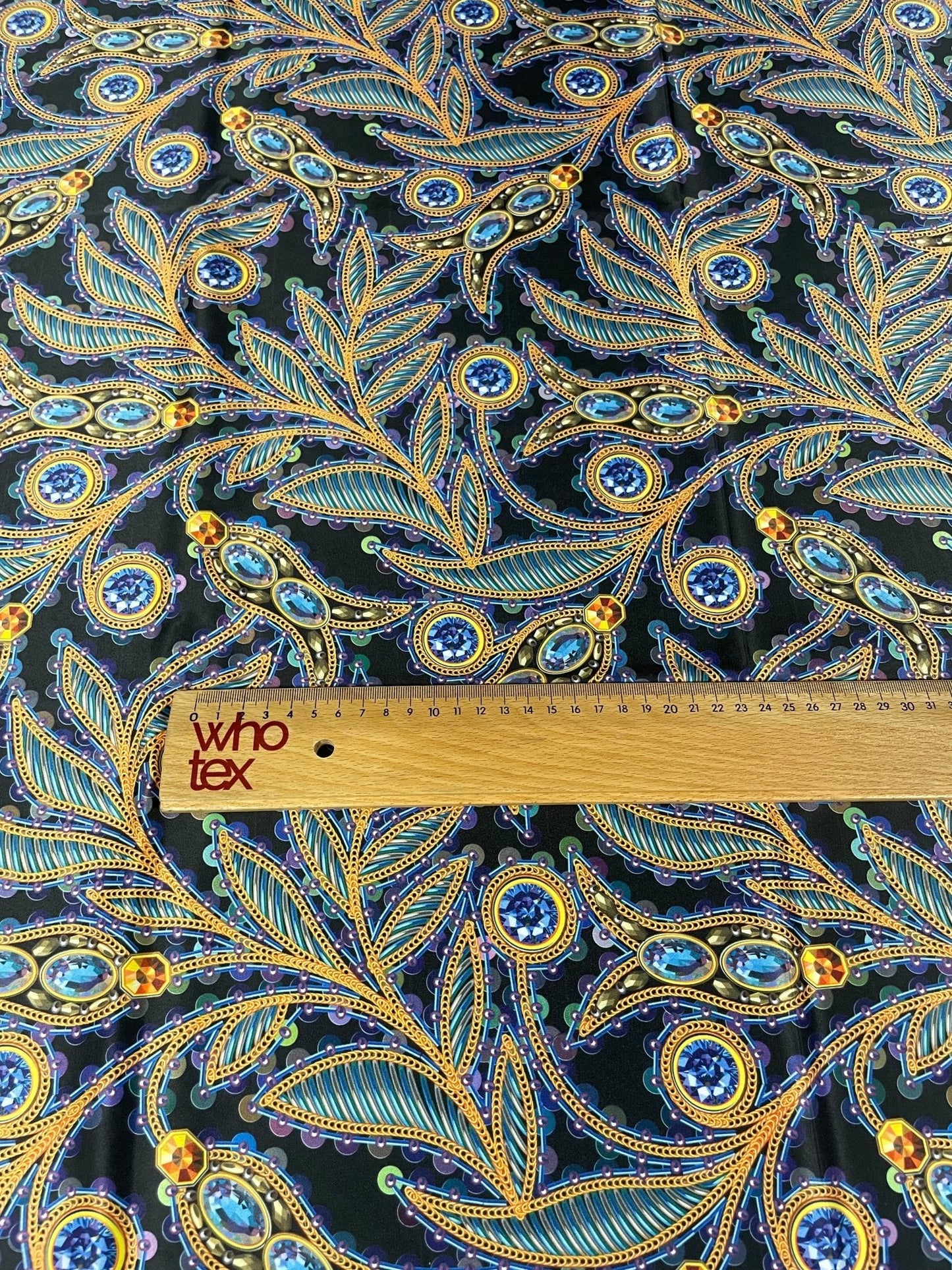 Luxury Peacock Feather Fabric with Jewel Accents