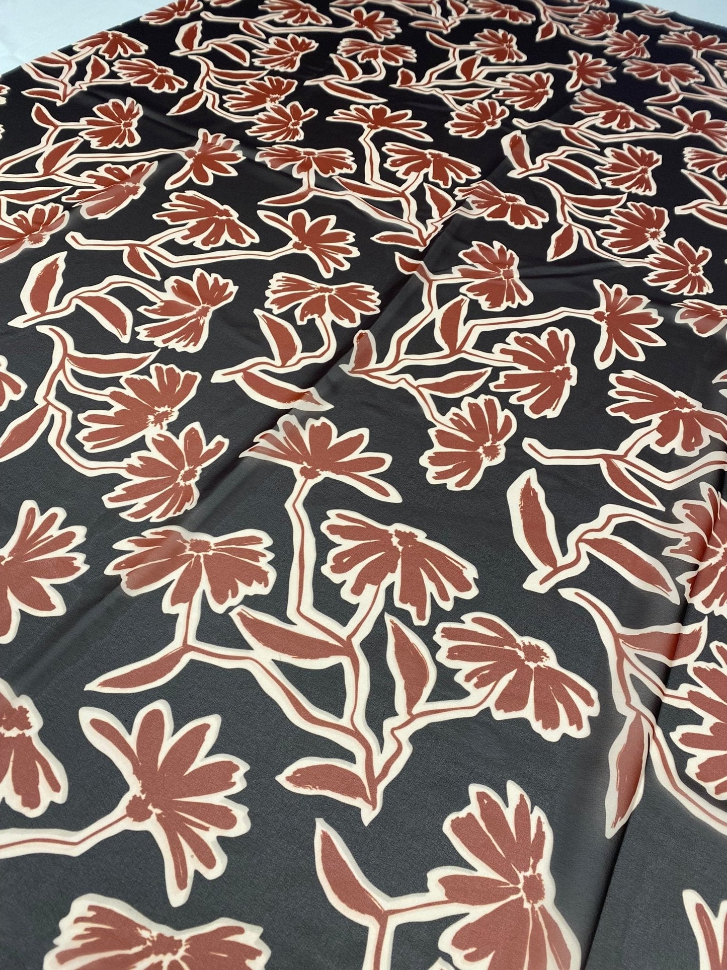 Rust Red Floral Print Fabric on Black Background