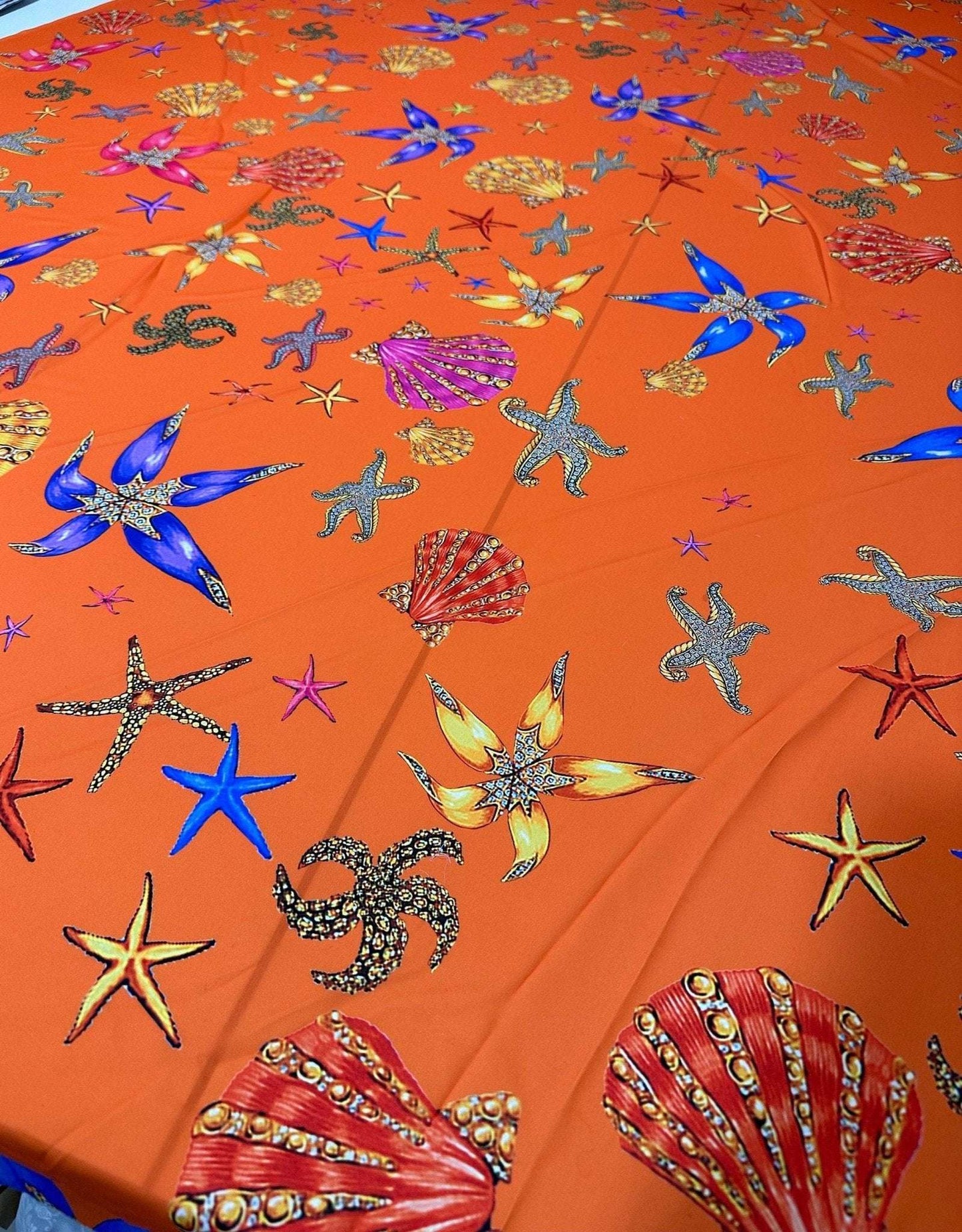 Orange Oyster Sea Shell Pattern Fabric – Available in Satin, Crepe, Spandex & Chiffon | By Metre