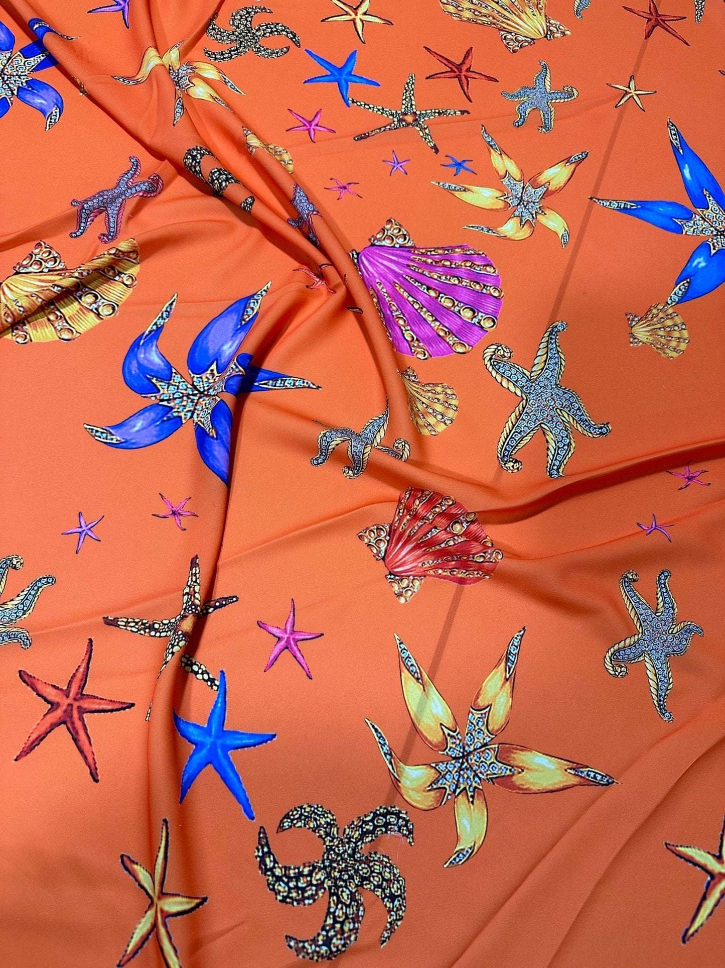 Orange Oyster Sea Shell Pattern Fabric – Available in Satin, Crepe, Spandex & Chiffon | By Metre