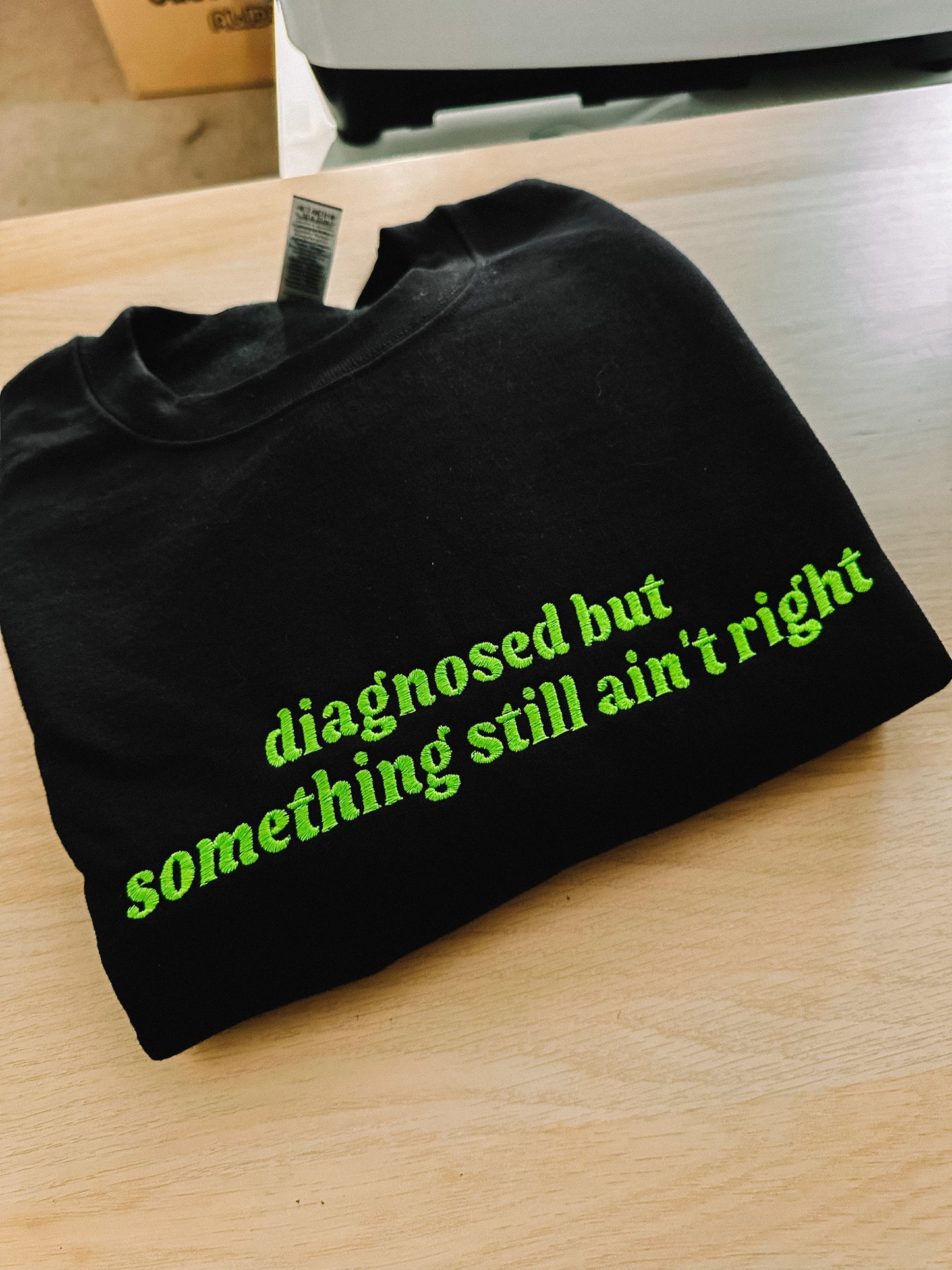 Diagnosed But Something Still Ain’t Right embroidered crewneck sweatshirt