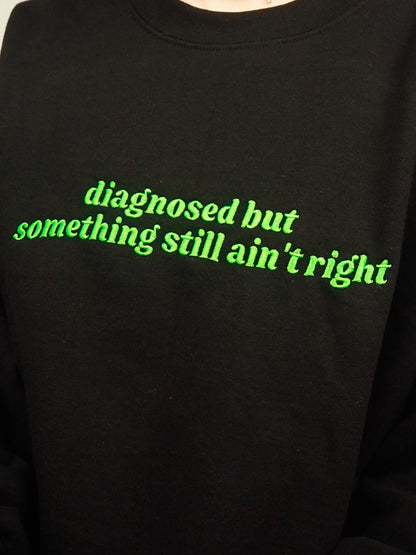 Diagnosed But Something Still Ain’t Right embroidered crewneck sweatshirt