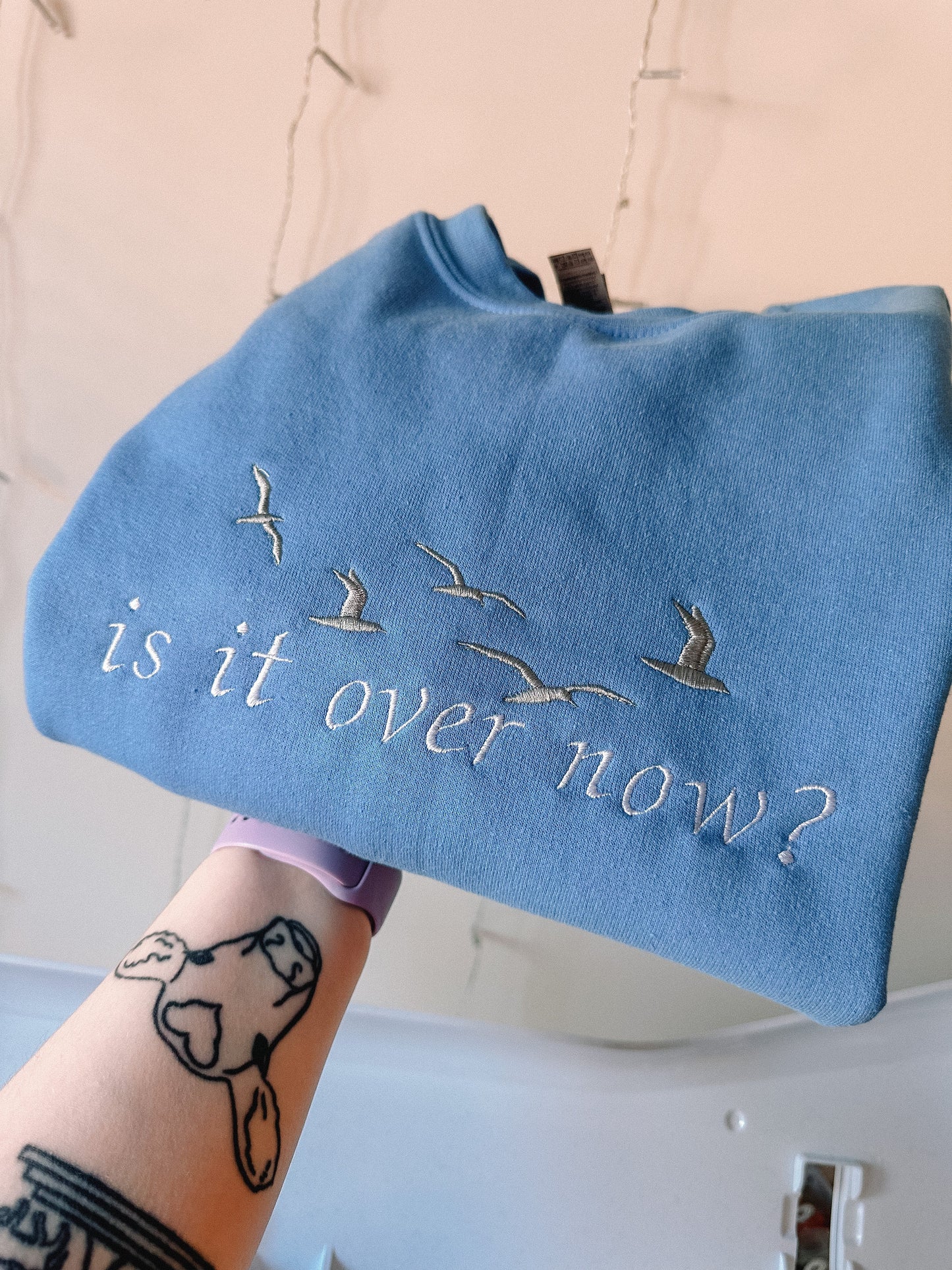 Is It Over Now embroidered crewneck sweatshirt