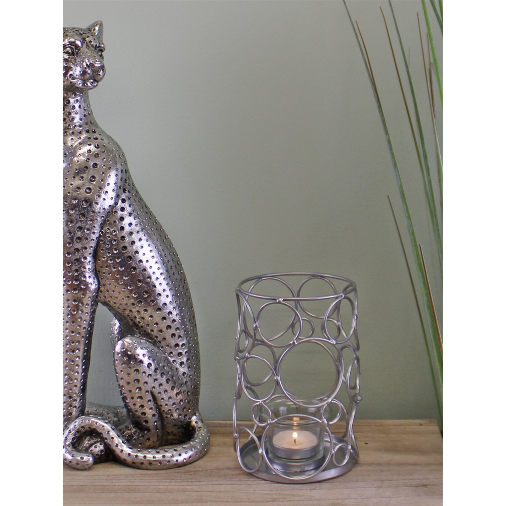 Stylish Silver Metal Abstract Candle Holder - Perfect for Any Home Decor